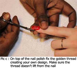 On top of the nail polish fix the golden thread creating your own design. Make sure the thread doesn’t lift from the nail surface.